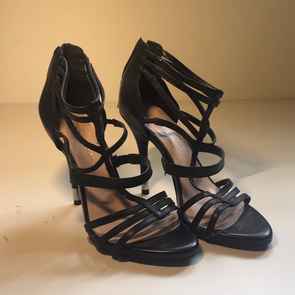 Strappy high heels.